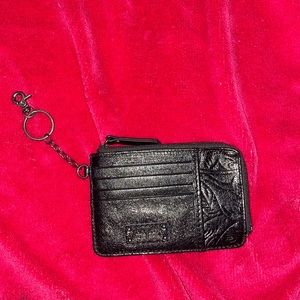 Like new The Sak clip on wallet in excellent condition